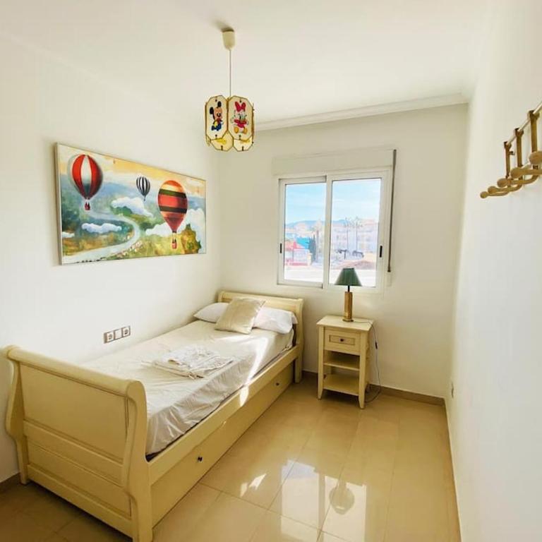 Apartamento en primera línea de playa con piscina y garaje gratuito - Two-Bedroom Apartment - 37