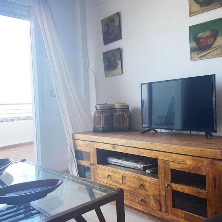 Apartamento en primera línea de playa con piscina y garaje gratuito - Two-Bedroom Apartment - 23