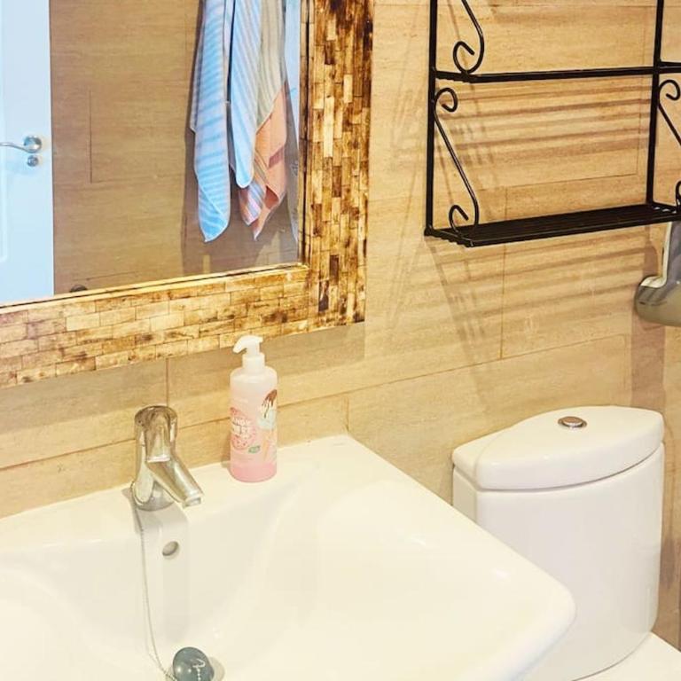 Apartamento en primera línea de playa con piscina y garaje gratuito - Two-Bedroom Apartment - 35