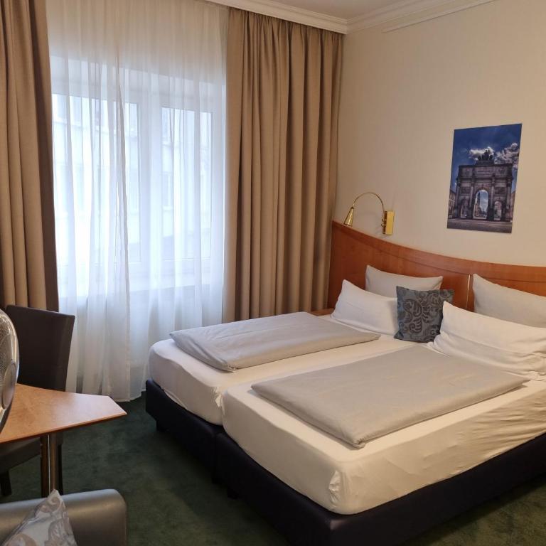 myMINGA4 - Hotel & serviced Apartments - Großes Zweibettzimmer - 3