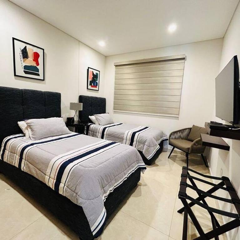 Lujoso departamento frente al mar/camino al mar - Two-Bedroom Apartment - 13