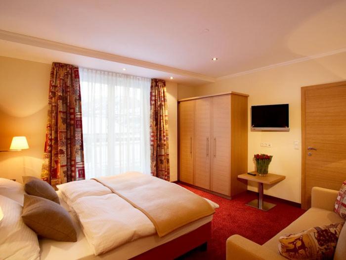 Sonnblick Apartments und Zimmer - Nationalpark Sommercard inklusive - Doppelzimmer mit Balkon - 1