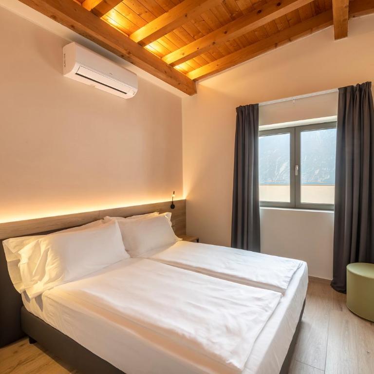 Evo Suites Apartments - Attico con Vasca Idromassaggio e Terrazza Vista Lago - 9