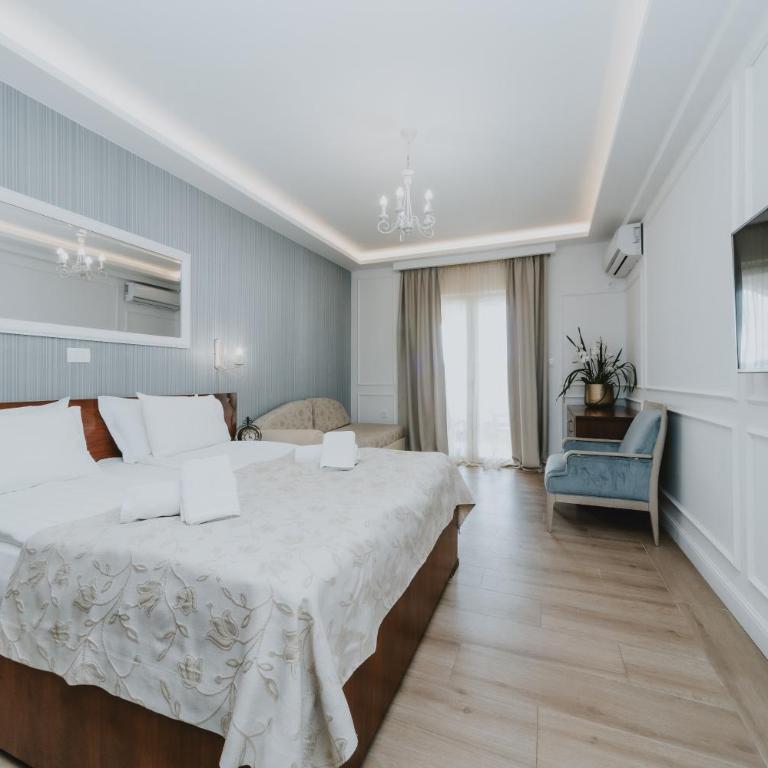 Mali Hotel Porat - Deluks Dvokrevetna Soba sa Bračnim Krevetom, Izlazom na Terasu i Pogledom na More (21) - 1