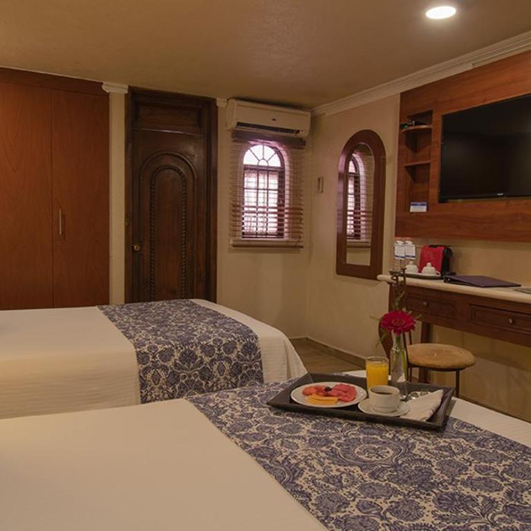 Arcángel Puebla - Doppelzimmer mit 2 Doppelbetten - 1