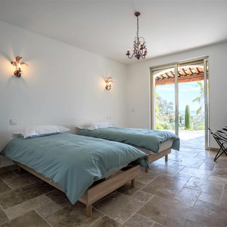 VILLA L'ESTEREL AVEC PISCINE VUE MER -MANDELIEU 06210- 6 Pers - Haus mit 3 Schlafzimmern - 26