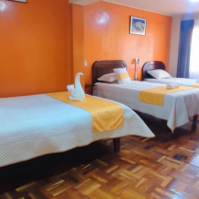 Hotel Express - Habitación Cuádruple con baño privado - 2