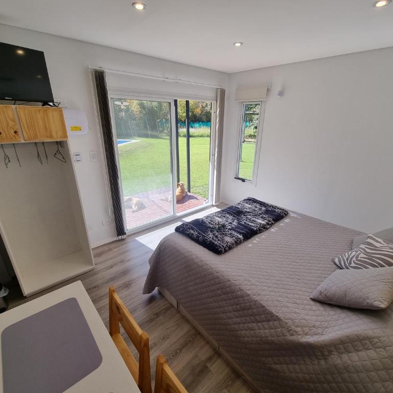 MiniCasas Modulares - Suite con cama grande y vistas a la piscina - 7