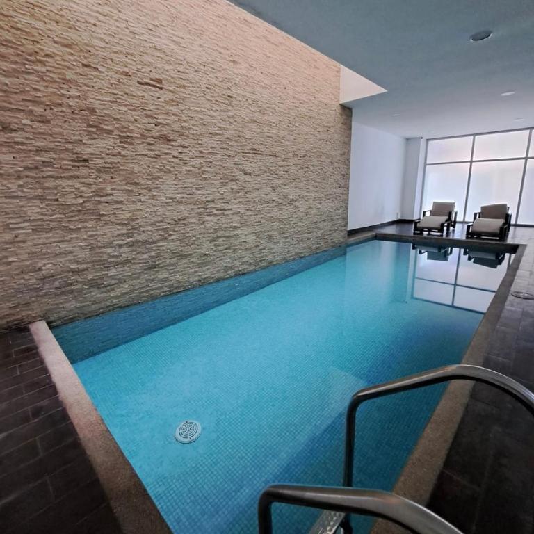 Suite con vista a la ciudad con Piscina-Gym-Parqueo gratuito-Seguridad 24/7 - Apartamento de 1 dormitorio - 7