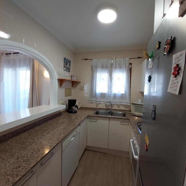 Villa totalmente independiente con piscina comunitaria - Villa con vistas al jardín - 28
