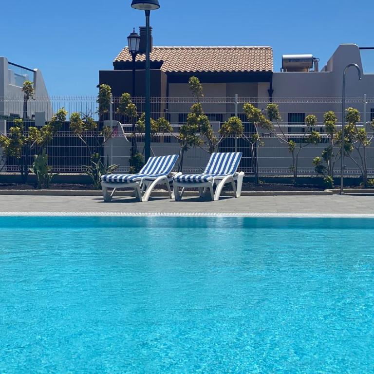 Sunny Luxury Apartment with two great sunny - level terraces, two swimming pools, in a new complex Pueblo Majorero, close to Fuerteventura Golf Club, next to the beach , Atlantico Shopping Mall and casino in Caleta de Fuste - Two-Bedroom Apartment - 5