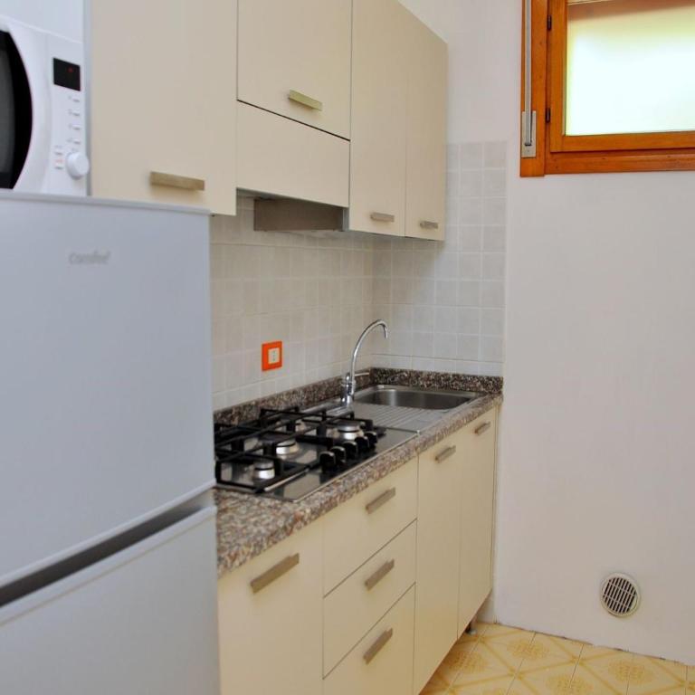 Enjoy a relaxing terrace in Bibione Pineda - Apartment - 4