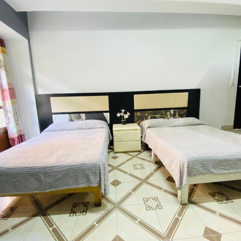 WHOST Hotel y Hostal - Quadruple Room with Balcony - 9