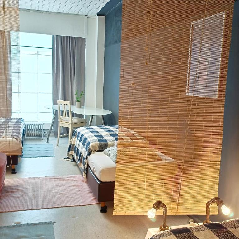 Lounge-Style-Hostel - Basic Dreibettzimmer mit Gemeinschaftsbad - 5