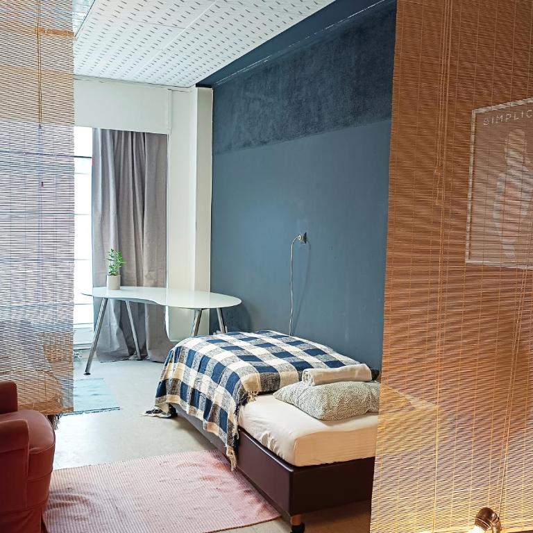 Lounge-Style-Hostel - Basic Dreibettzimmer mit Gemeinschaftsbad - 2