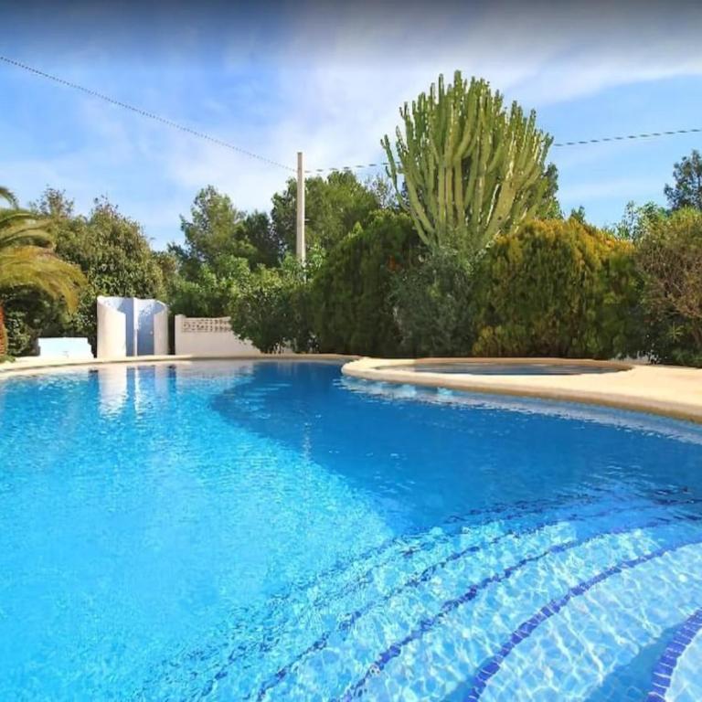 Villa totalmente independiente con piscina comunitaria - Villa con vistas al jardín - 9