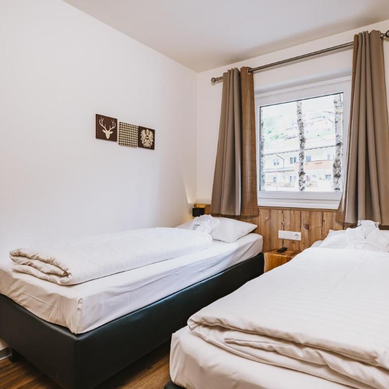 AvenidA Mountain Lodges Kaprun - Suite mit 2 Schlafzimmern - 7