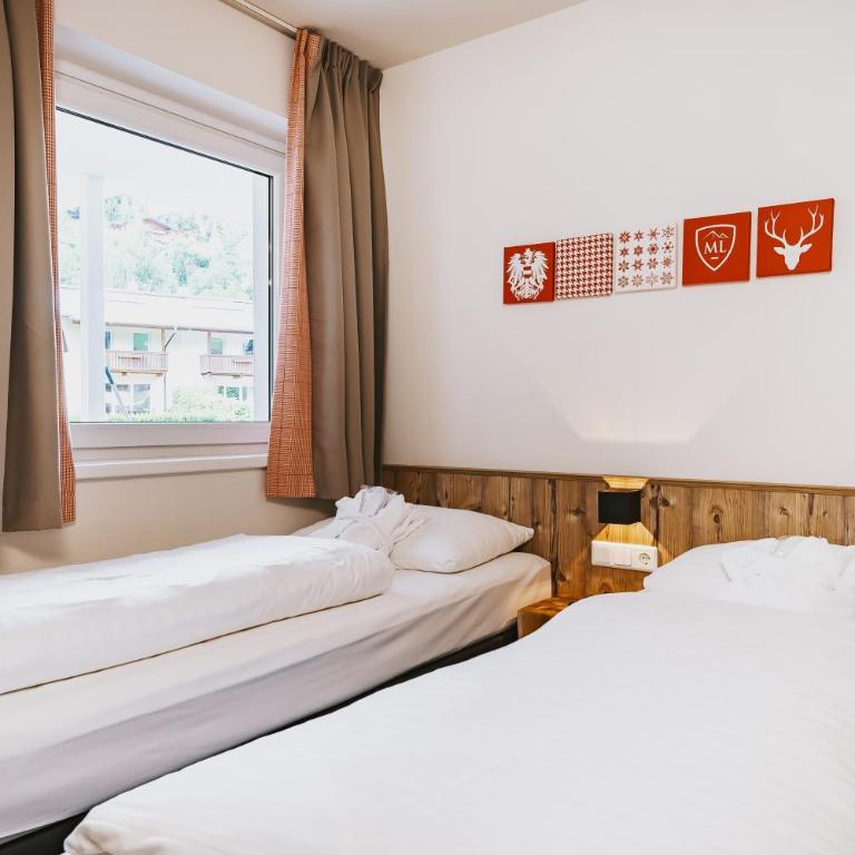AvenidA Mountain Lodges Kaprun - Suite mit 3 Schlafzimmern - 8
