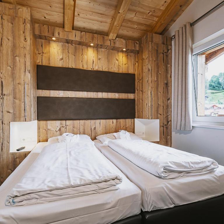 AvenidA Mountain Lodges Kaprun - Penthouse mit 4 Schlafzimmern und Balkon - 5