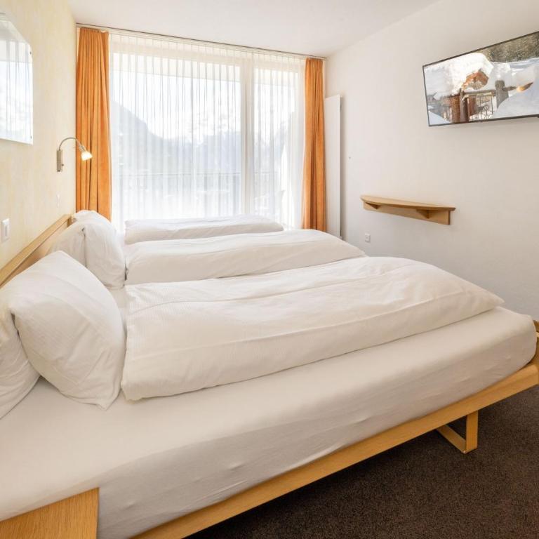 Aktiv Hotel & Spa Hannigalp - Superior Dreibettzimmer - 3