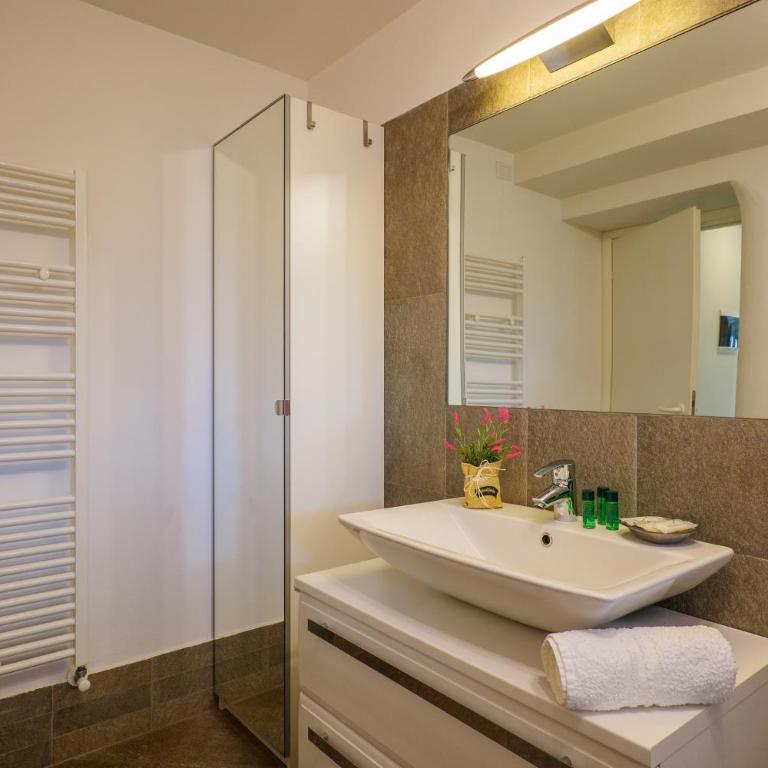 Residence Girasole Casa Rossa B - Appartamento con 1 Camera da Letto e Giardino Privato - 14