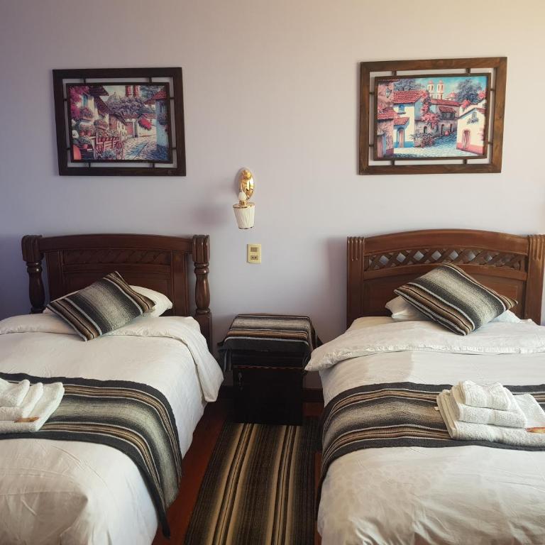 Hostal Phaxsi - Habitación Doble Deluxe - 1 o 2 camas - 11