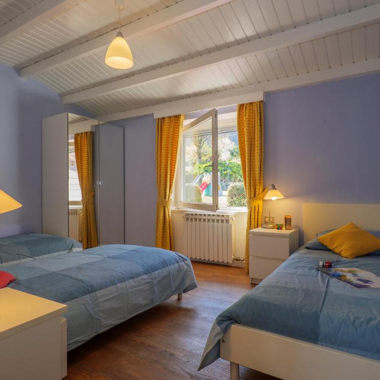 Casa del Sole - Appartamento con Terrazza e Vista Giardino - 14