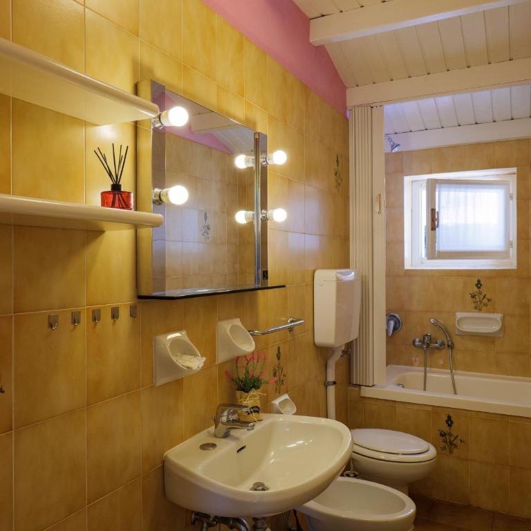 Casa del Sole - Appartamento con Terrazza e Vista Giardino - 10