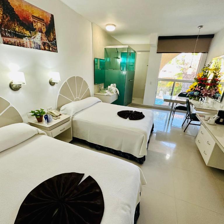 Hotel Plaza Caribe - Habitación Doble Deluxe - 9