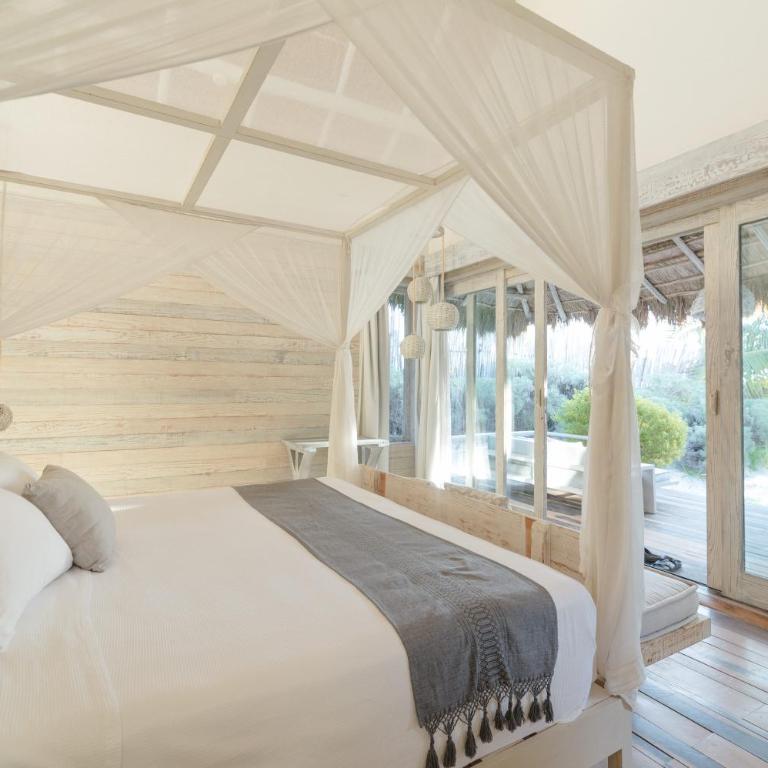Kai Tulum - Suite con cama grande y vistas parciales al mar - 5