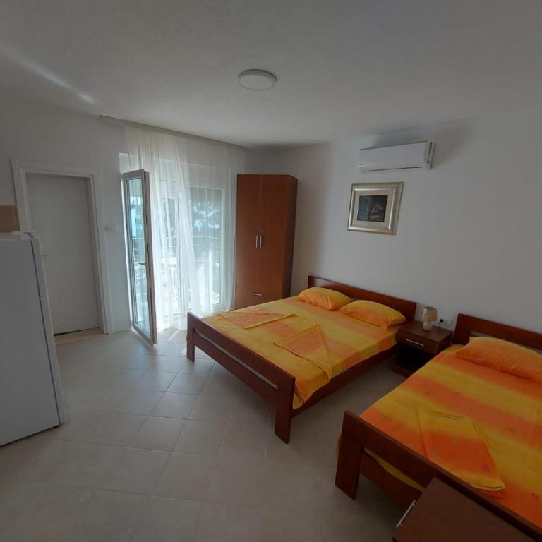Apartmani Sunce - Deluks Trokrevetna Soba sa Pogledom na More - 3