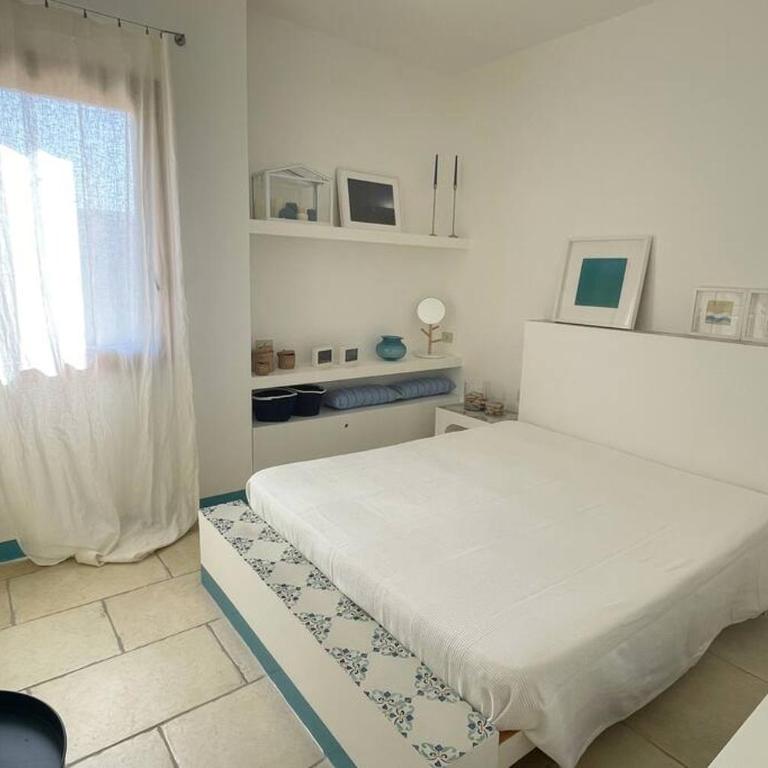 Appartamento con giardino a due passi dal mare. - Two-Bedroom House - 12