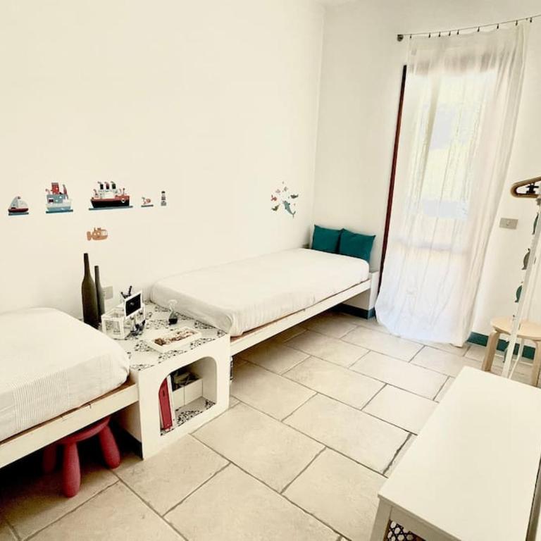 Appartamento con giardino a due passi dal mare. - Two-Bedroom House - 18