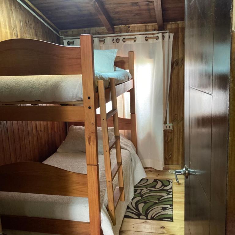 Cabañas granja Central - Three-Bedroom House - 13