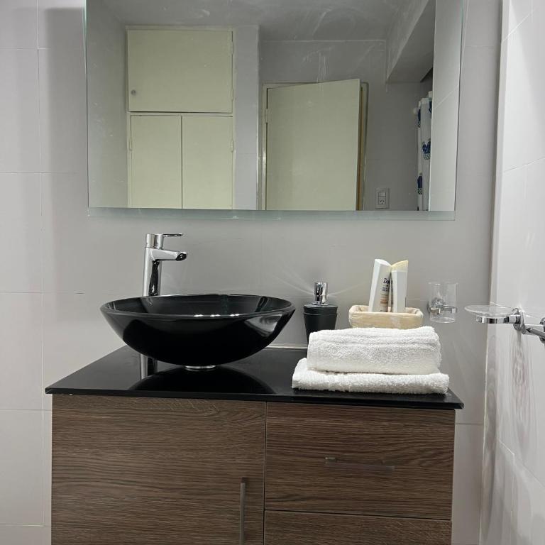 Departamento en pleno centro con cochera - Apartamento de 3 dormitorios - 13