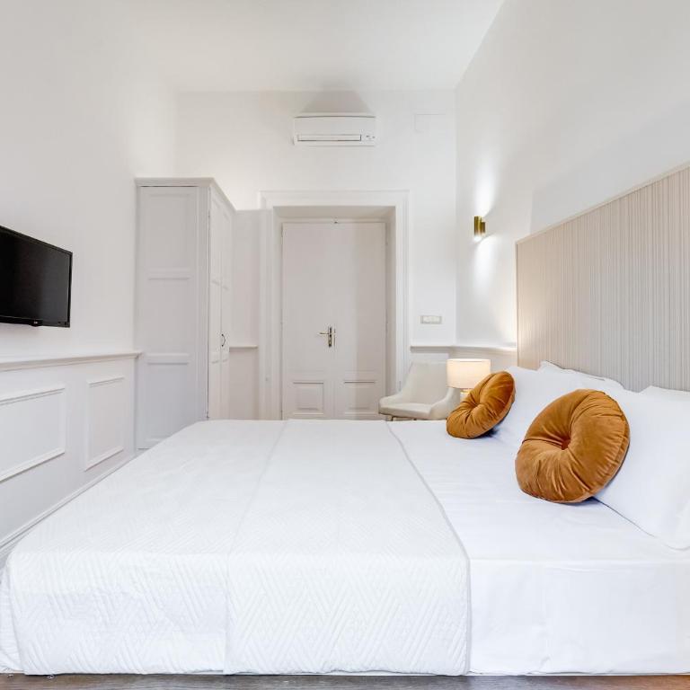Monti Suites Cavour - Camera Quadrupla con Bagno Privato Esterno - 7