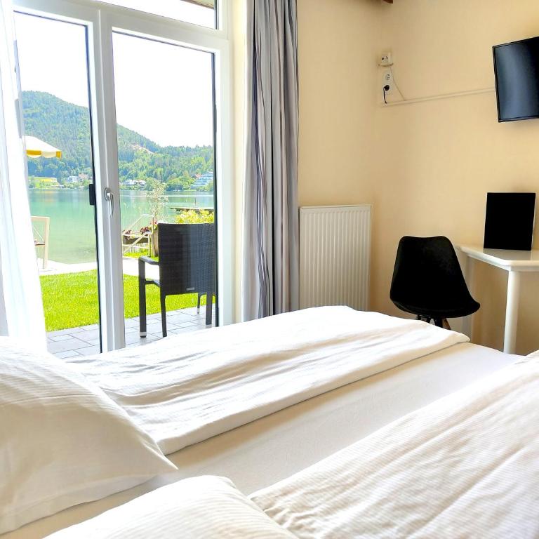 Haus am See - Doppelzimmer mit Terrasse und Seeblick - 4