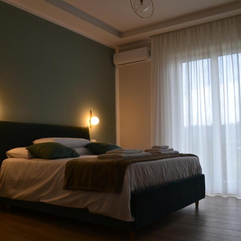 Luna Nuova Suites - Camera Matrimoniale Deluxe con Balcone - 8