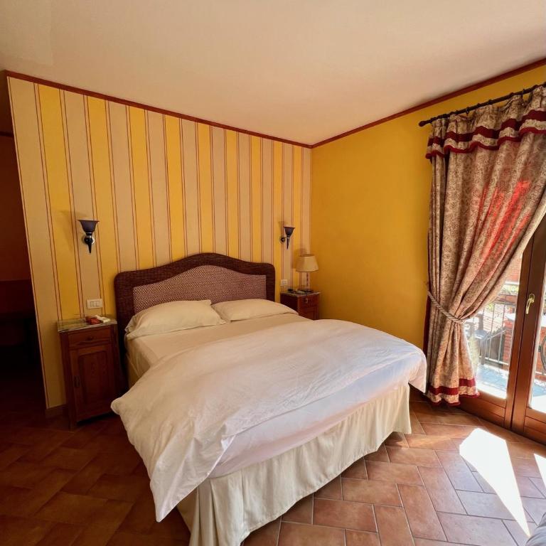 La Griglia Hotel - Camera Matrimoniale con Letto Supplementare - 3