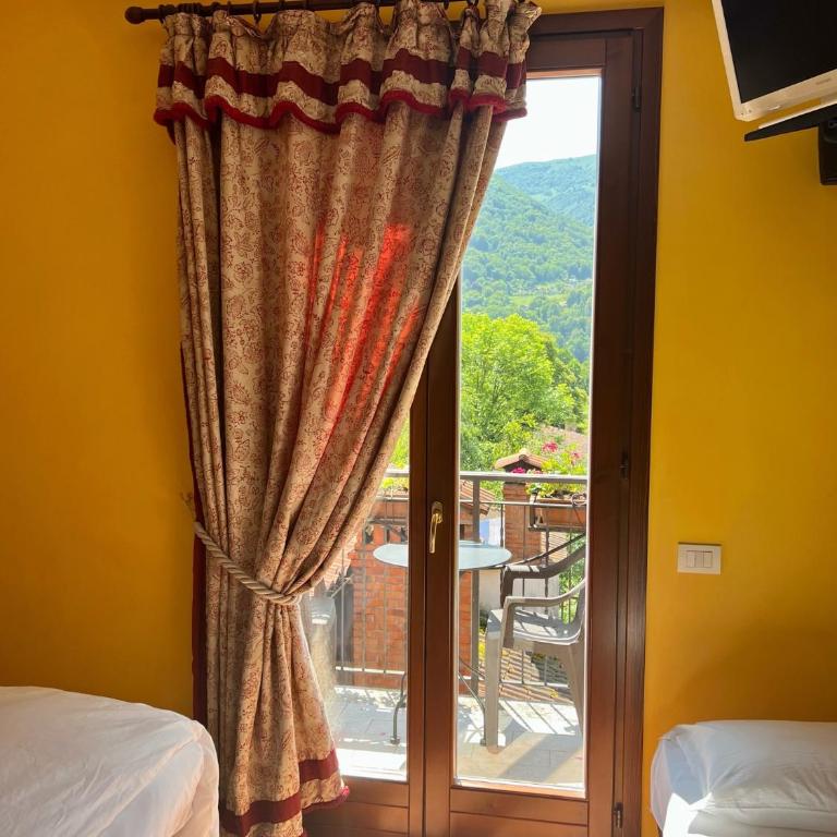 La Griglia Hotel - Camera Matrimoniale con Letto Supplementare - 2