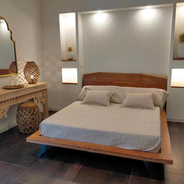 Amelia Apts & Rooms - Camera Matrimoniale con Patio - 1
