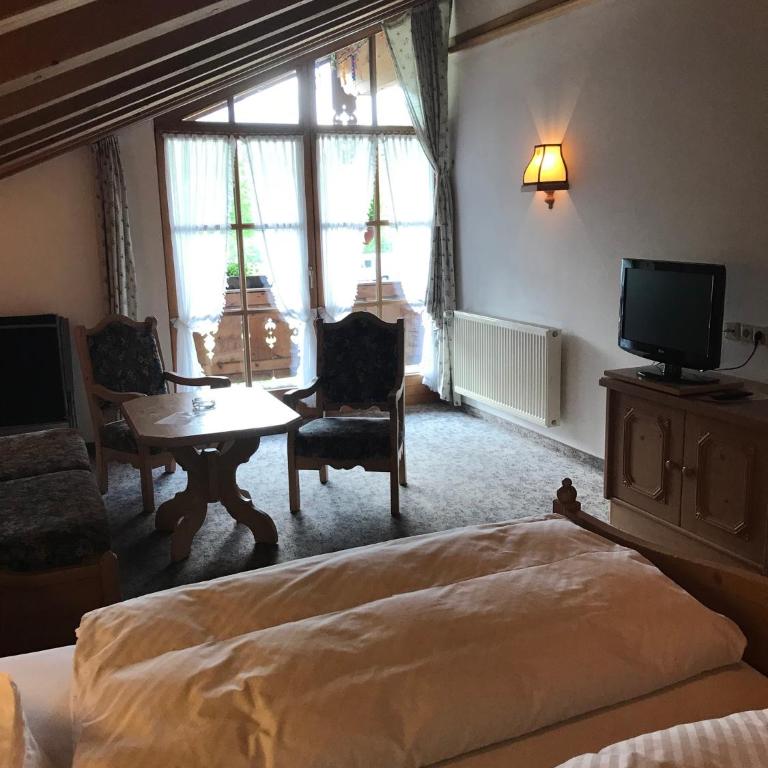 Gästehaus Schwarzlofer - Comfort Vierbettzimmer - 13