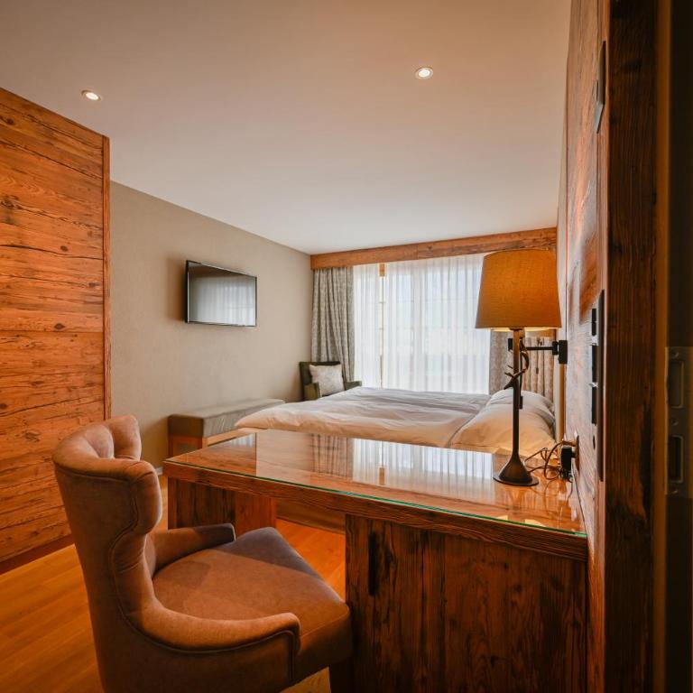 Romantik Hotel Schweizerhof - Superior Suite mit 3 Schlafzimmern mit Blick auf den Eiger - 4