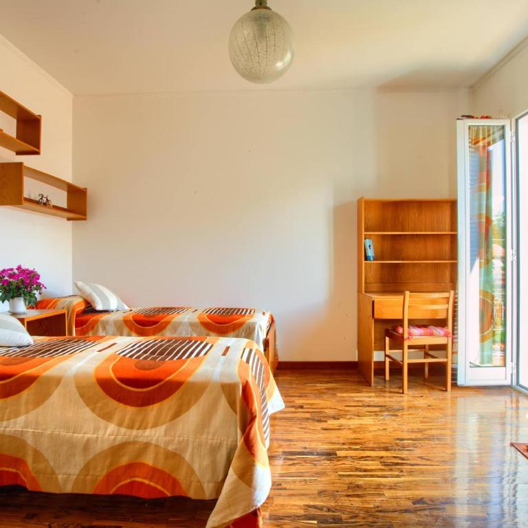 casa con giardino, garage, wi-fi, 2 bagni e AC in una camera da letto - Casa con 2 Camere da Letto - 16