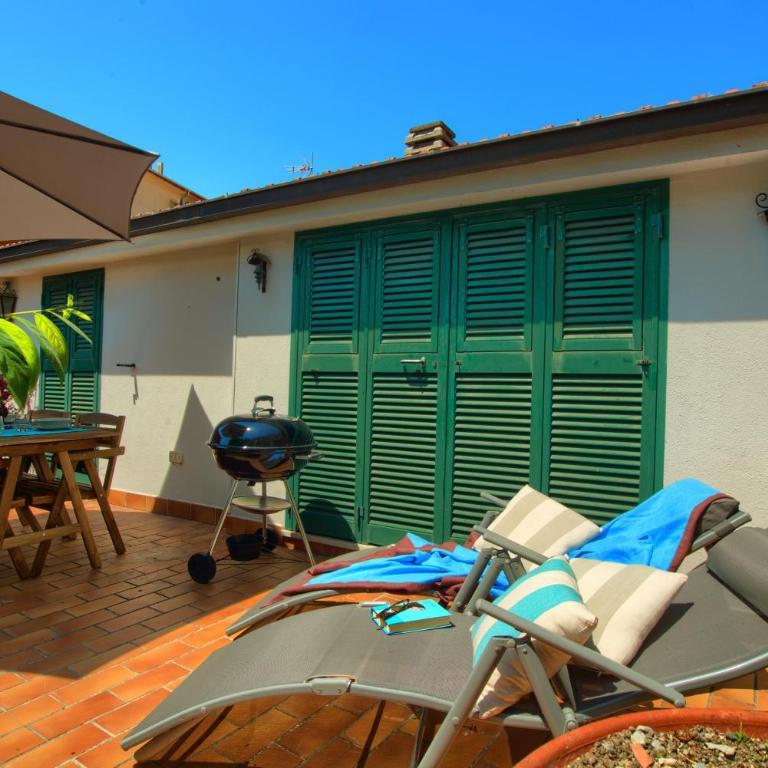 casa con giardino, garage, wi-fi, 2 bagni e AC in una camera da letto - Casa con 2 Camere da Letto - 9