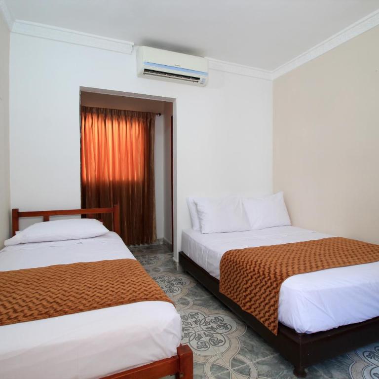 Hotel Rodadero Inn By GEH Suites - Triple Room - 1