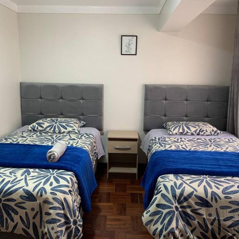 Centric & cozy apartment with Garage - Three-Bedroom Apartment - 24