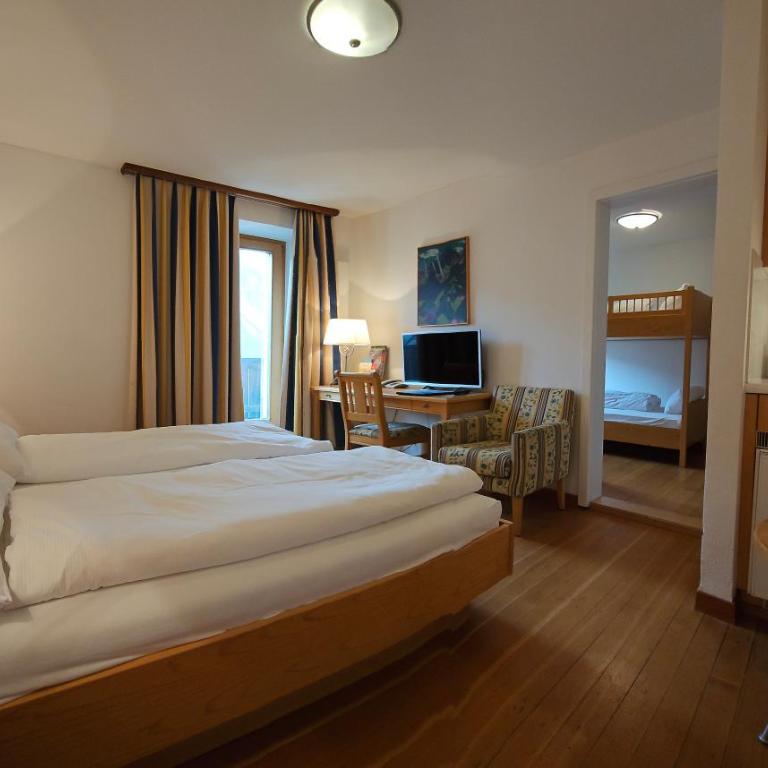 Aparthotel Muchetta - Familienzimmer mit Bergblick - 3