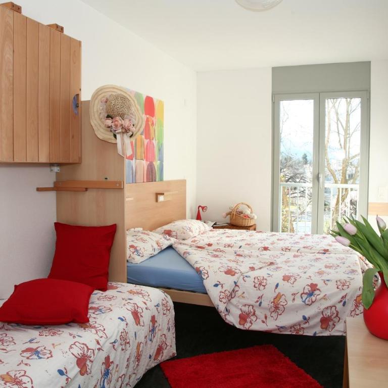 Lugano Savosa Youth Hostel - Camera Quadrupla Economy con Bagno in Comune - 3