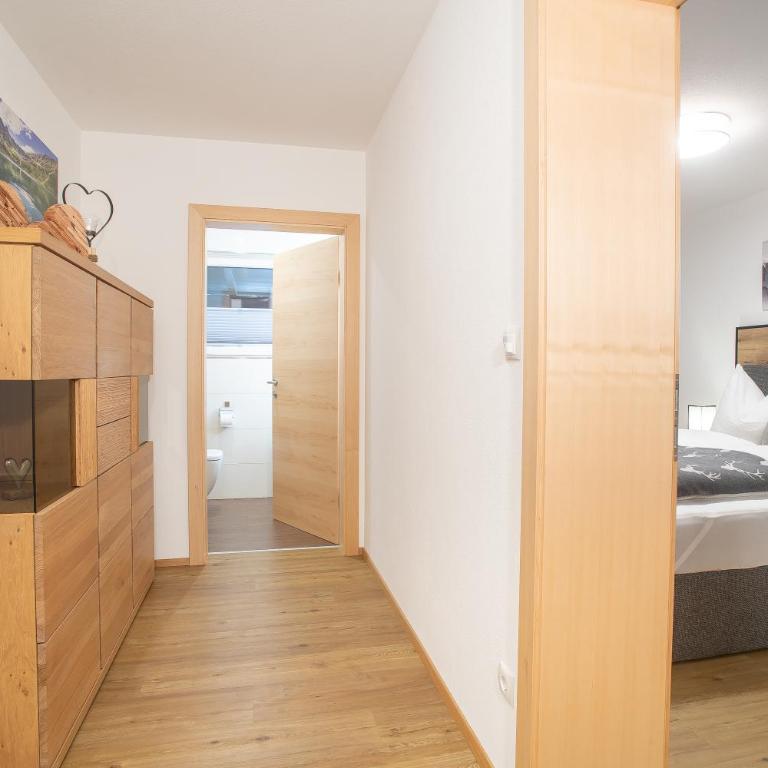 Apart Dahoam - Premium Apartment mit 3 Schlafzimmern und Gartenblick - 24